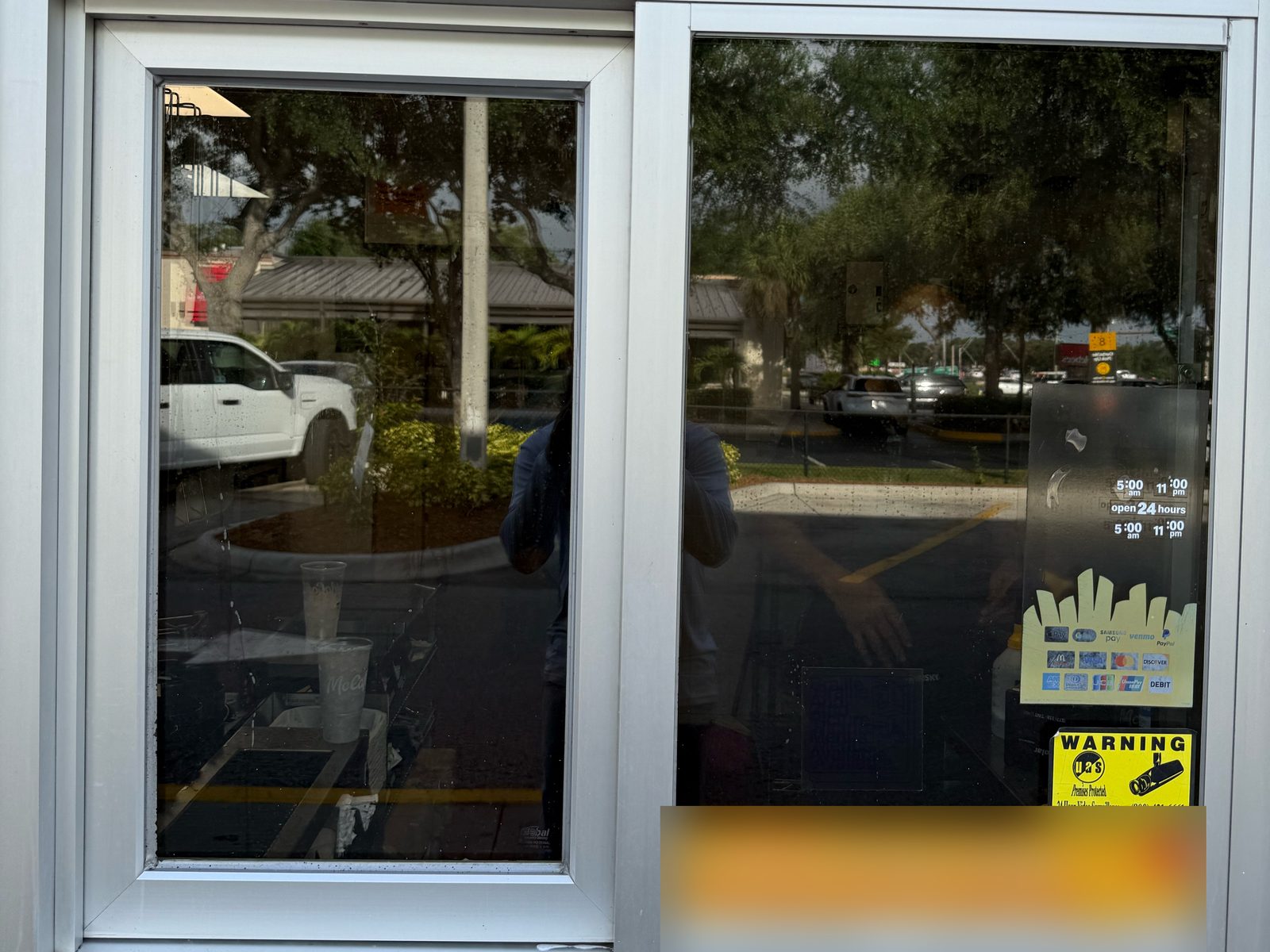 Drive-thru window with new film