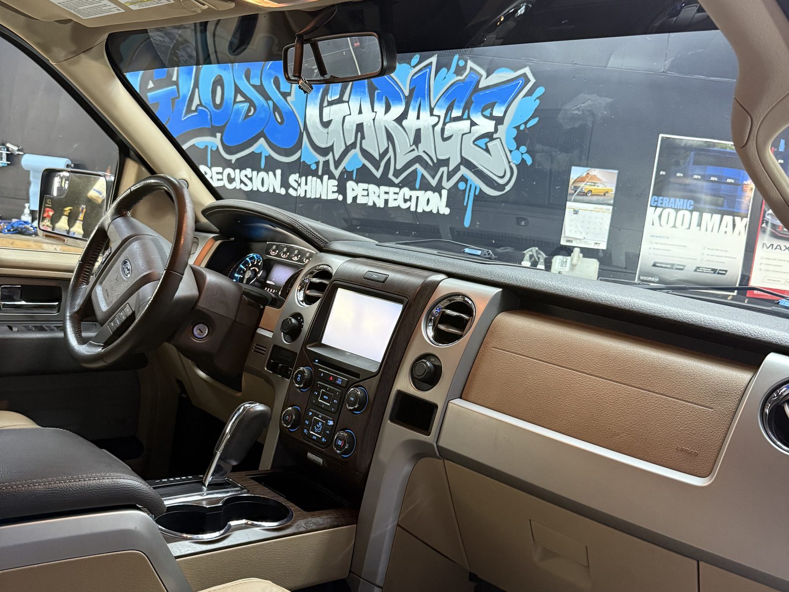 Clean dash with the mural visible through the windshield