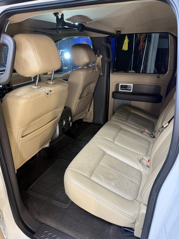 Clean tan leather rear seat