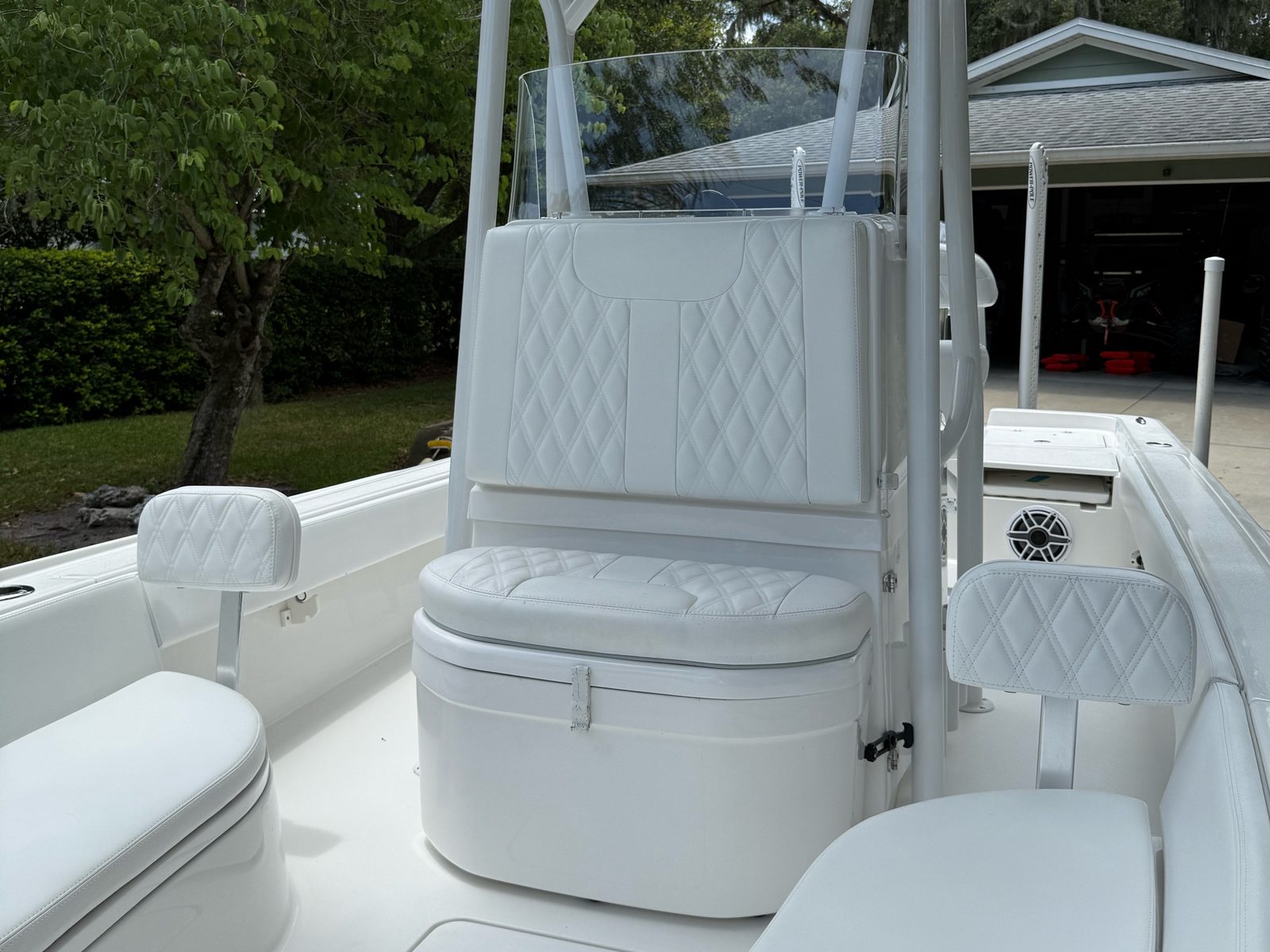 Clean white diamond-stitched helm seating
