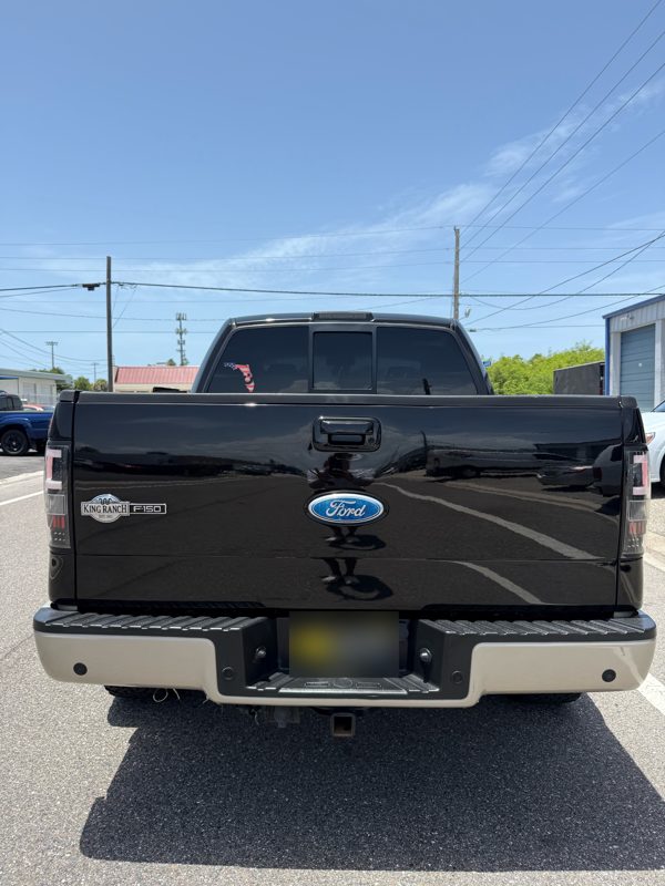 The same tailgate corrected and coated, deep black